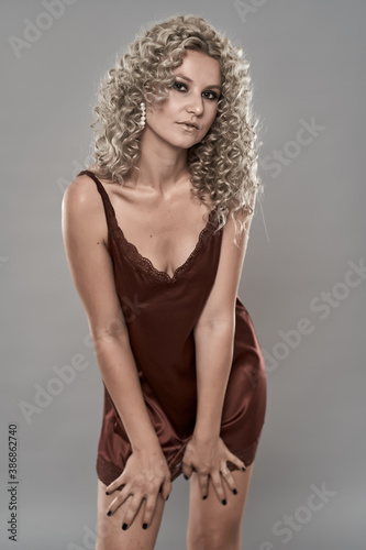 Glamour model with curly blond hair