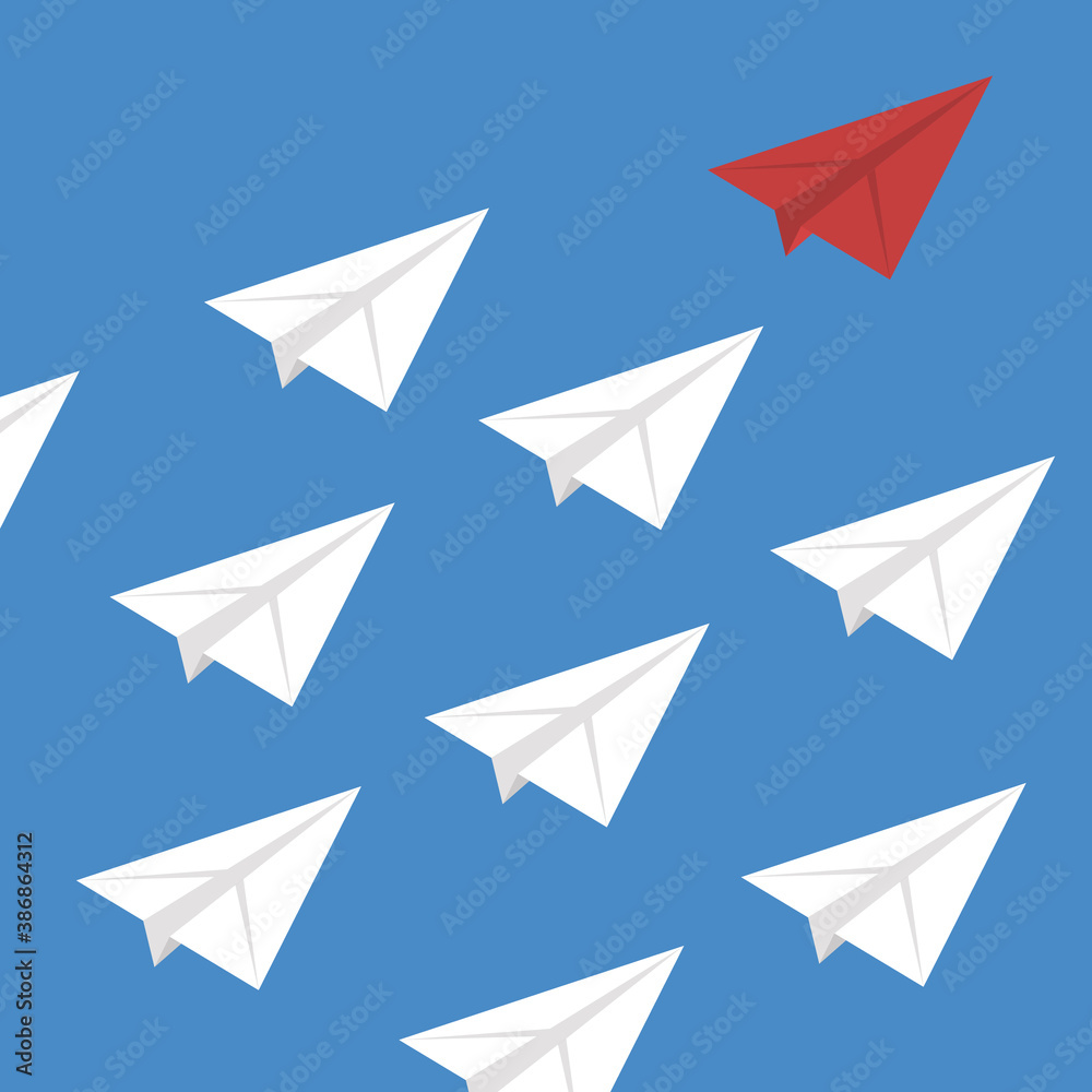Think differently concept. Red airplane changing direction. New idea, change, trend, courage, creative solution, innovation and unique way concept. Think differently concept. Red airplane changing direction. New idea, change, trend, courage, creative solution, innovation and unique way concept.