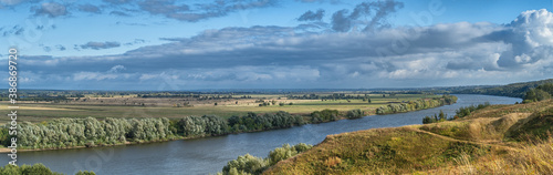 Panorama of the Russian Oka river before sunset on a clear autumn day.