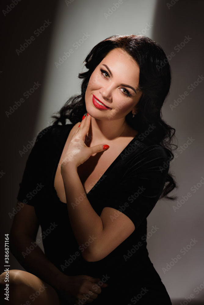 Portrait of young pretty woman in elegant evening dress Portrait of young pretty woman in elegant evening dress