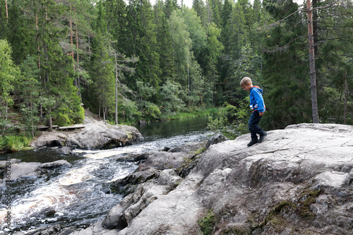 Child goes to Ruskeala waterfall
