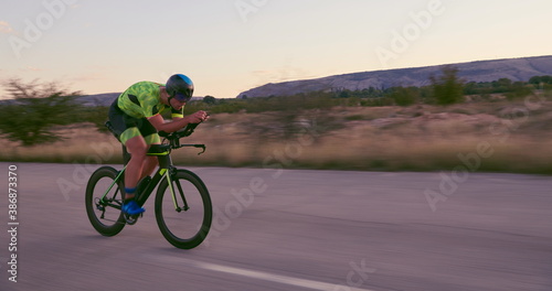 triathlon athlete riding a bike