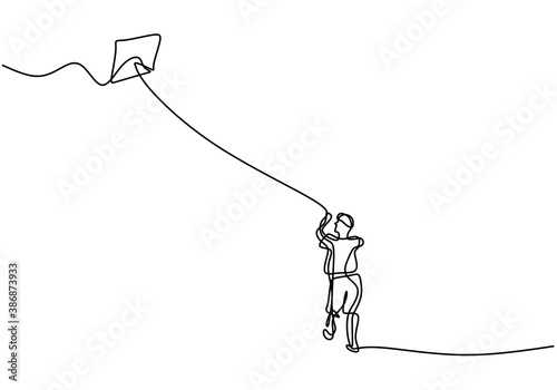 One single line drawing of young man playing a kite. Happy young energetic male playing to fly kite up into the sky at outdoor field. Freedom and passion creative theme. Minimalist design