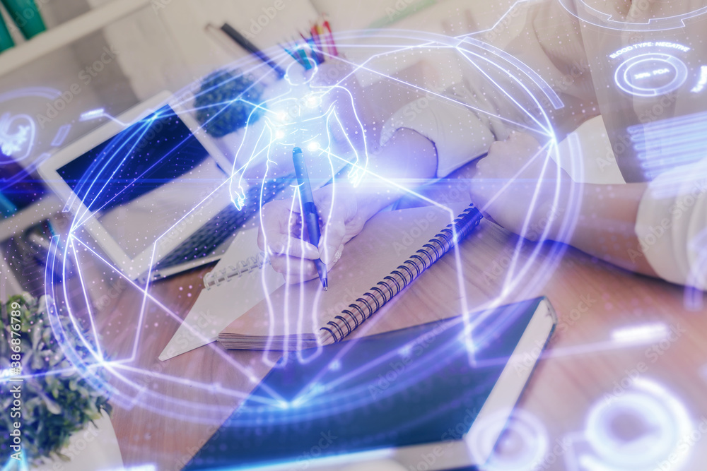 Education theme hologram over woman's hands writing background. Concept of study. Double exposure