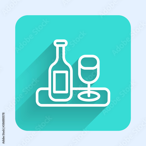 White line Wine bottle with glass icon isolated with long shadow. Green square button. Vector.