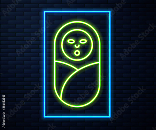 Glowing neon line Newborn baby infant swaddled or swaddling icon isolated on brick wall background. Baby kid child wrapped in blanket clothes. Vector.