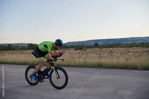 triathlon athlete riding a bike