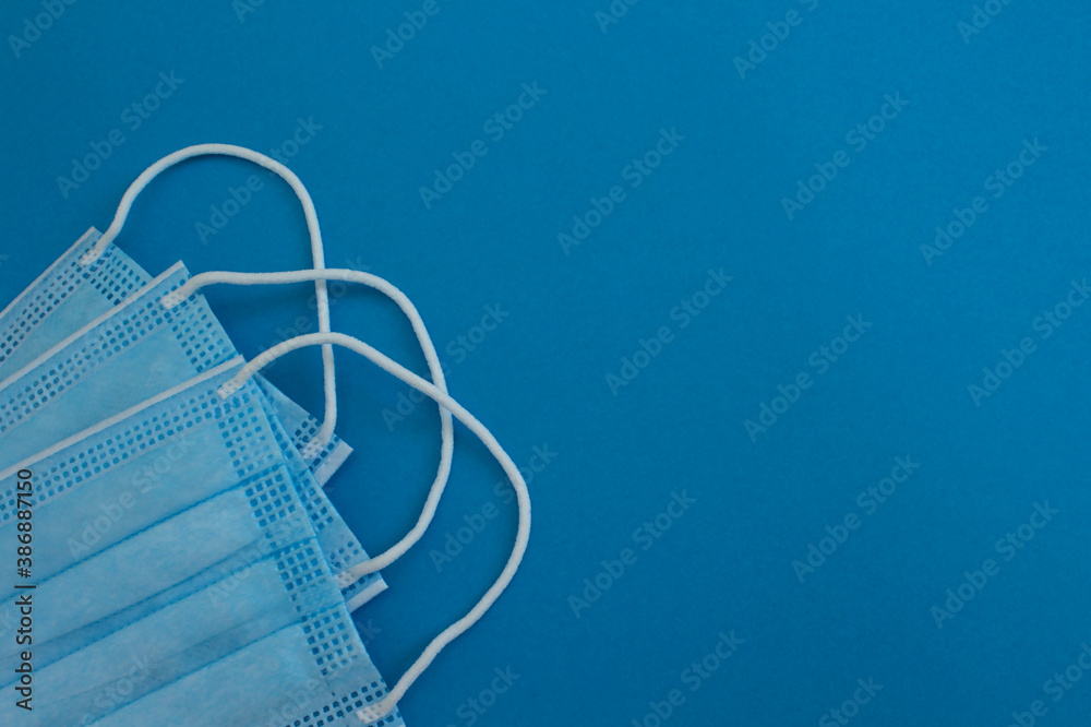 medical masks on a blue background medical masks on a blue background