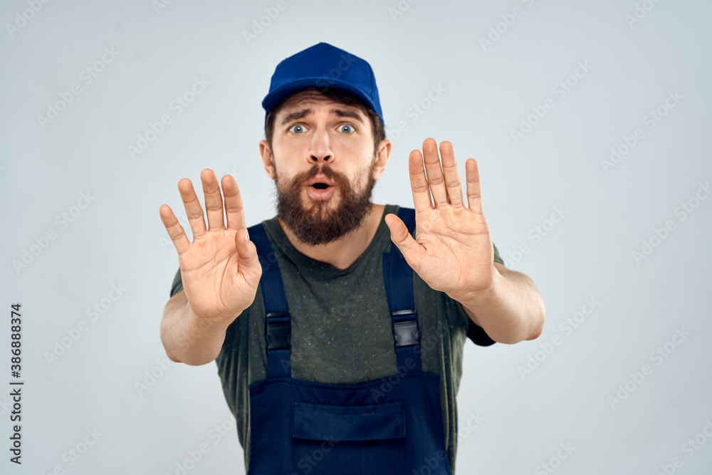 Fototapeta premium Man on working form emotions lifestyle delivery service light background