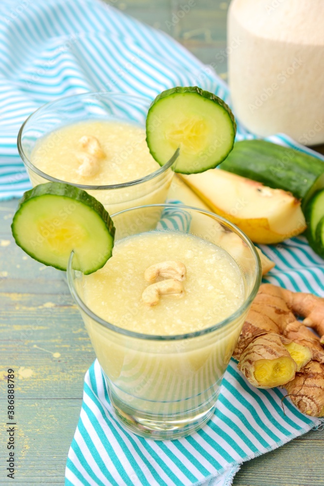 Cucumber pear juice with ginger, cashew nuts and coconut water Cucumber pear juice with ginger, cashew nuts and coconut water