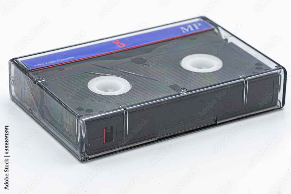 Obraz premium old 8mm magnetic tape on white background