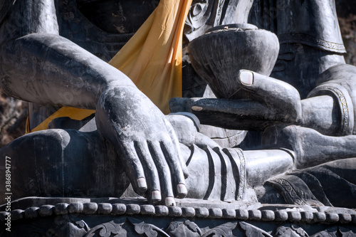 Detail of Buddha's hands in meditation.