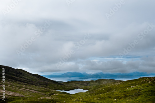 Bealach na Ba pass in the clouds, Applecross, Scotland. View towards loch