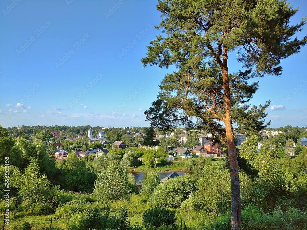 Fototapeta premium Torzhok, Tver region, Russia-June 30, 2020. View of Torzhok from the right Bank of the town.