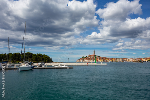 sailboat moored at the pier in harbour of Rovinj town, Croatia.