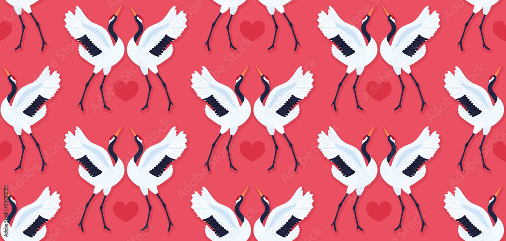 Fototapeta premium Seamless pattern with pair of red crowned cranes and heart. Repeating red background with dancing East Asian birds. Love and romance. Valentine's day design. Wallpaper, fabric, wrapping paper. Vector