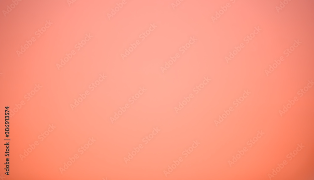 The background picture of peach color in a soft tone. There is a smooth ...