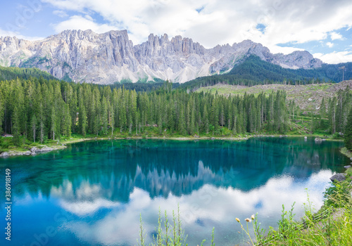 Amazing and turquoise Carezza lake, Dolomites Alps. South Tyrol. Italy © AnneSophie