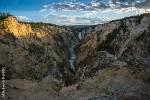 lower falls of the yellowstone national park from artist point at sunset, wyoming, usa