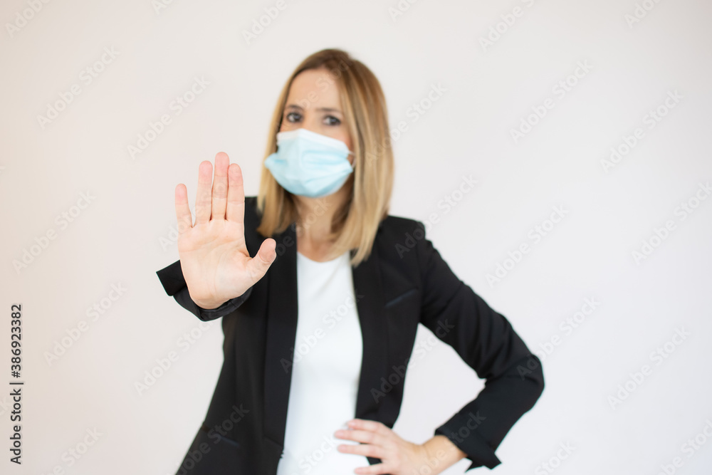 Young businesswoman making a rejection pose on a white background Young businesswoman making a rejection pose on a white background