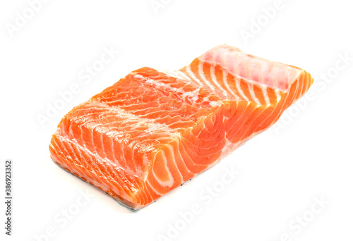 Piece of fresh salmon fillet sliced isolated on white background