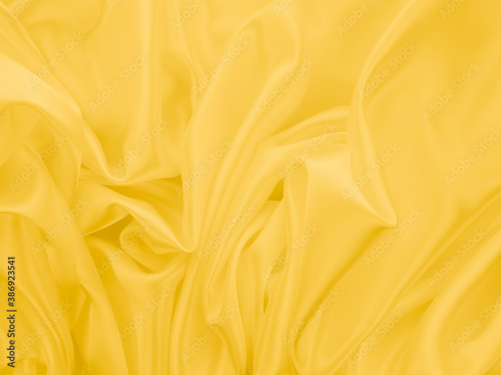 Beautiful smooth elegant wavy light yellow satin silk luxury cloth fabric texture, abstract background design. Copy space. 