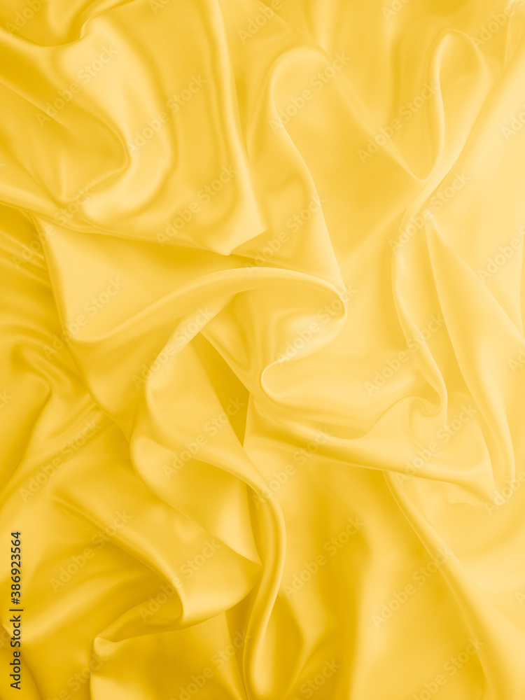 Beautiful smooth elegant wavy light yellow satin silk luxury cloth fabric texture, abstract background design. Copy space. Beautiful smooth elegant wavy light yellow satin silk luxury cloth fabric texture, abstract background design. Copy space.