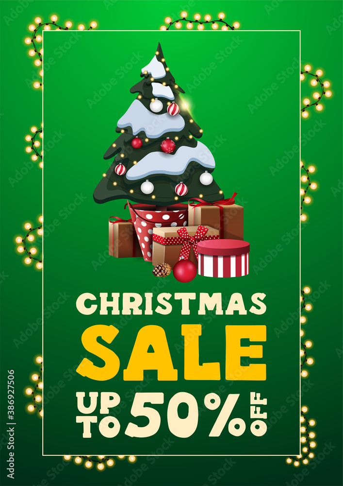 Christmas sale, up to 50% off, green vertical discount banner in minimalistic style with line garland frame and Christmas tree in a pot with gifts