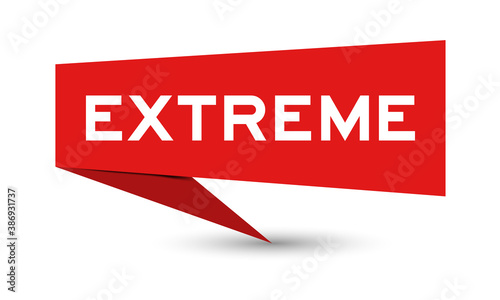 Red color paper speech banner with word extreme on white background
