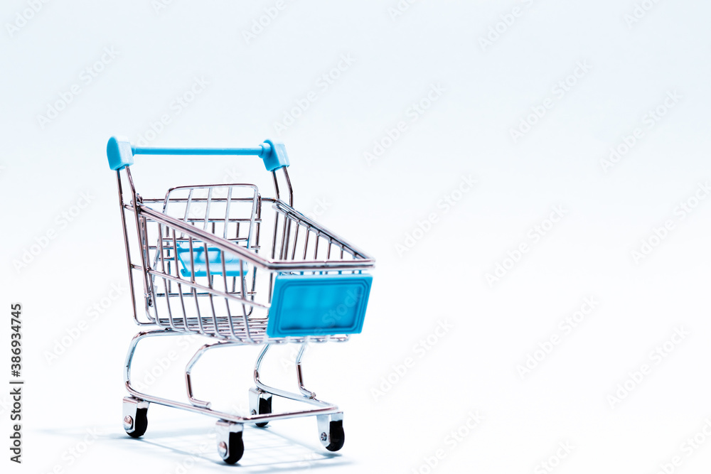 Shopping cart on white background. Copy Space. Shopping concept. Shopping cart on white background. Copy Space. Shopping concept.