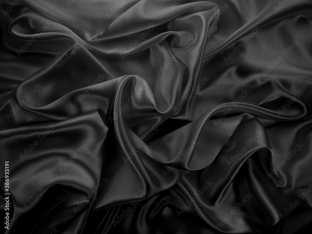 Beautiful elegant dark silver grey or black satin silk luxury cloth fabric texture, abstract background design. Beautiful elegant dark silver grey or black satin silk luxury cloth fabric texture, abstract background design.
