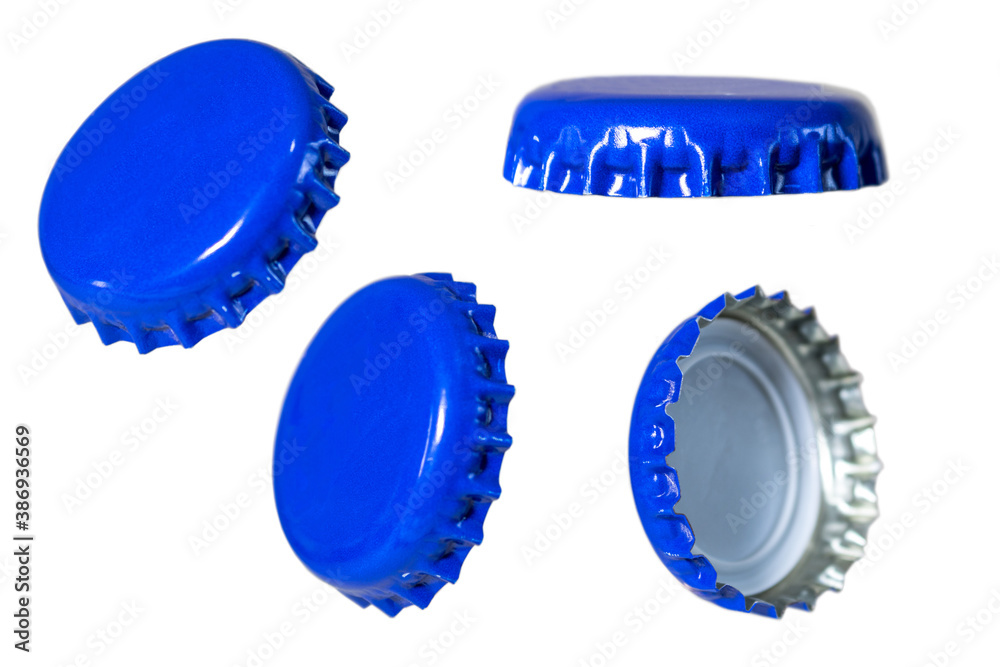 Different sides of of a red metal bottle cap. Isolated on white background. Different sides of of a red metal bottle cap. Isolated on white background.