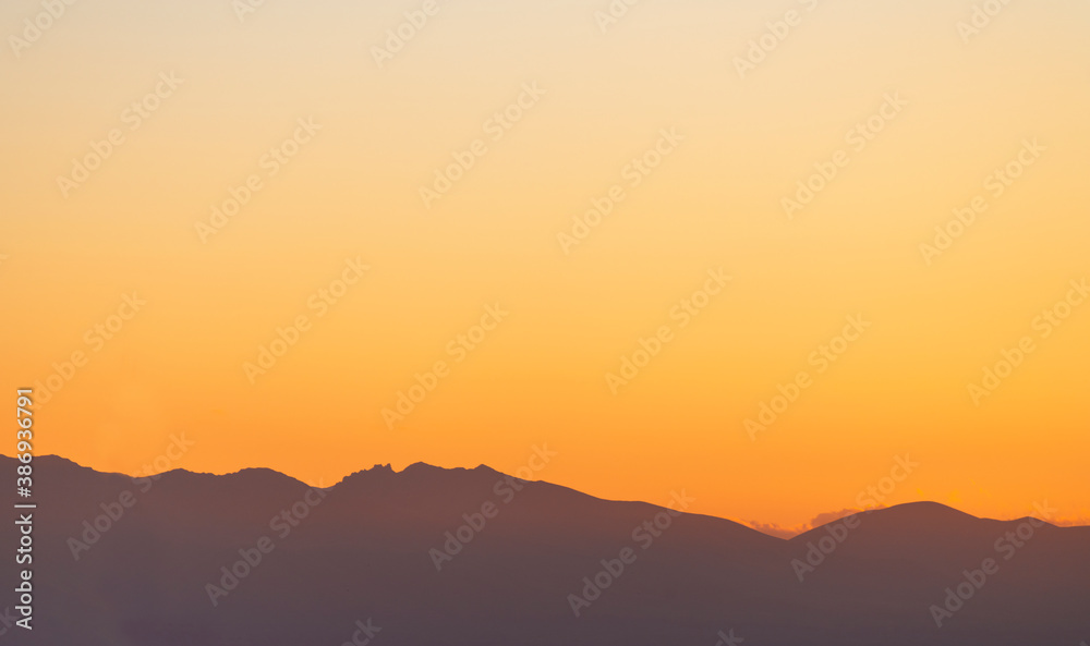 Beautiful panoramic  sunset over the mountains.