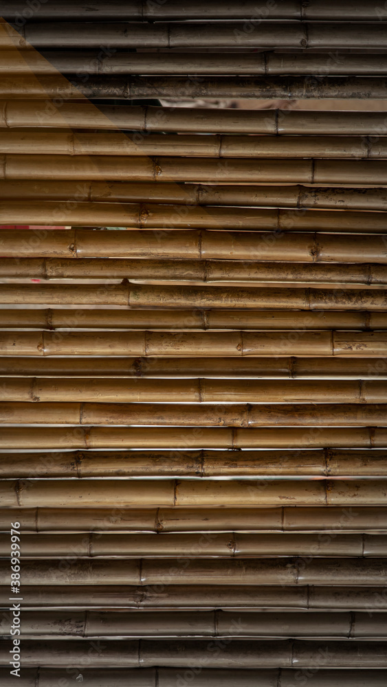 old brown tone bamboo plank fence texture for background old brown tone bamboo plank fence texture for background