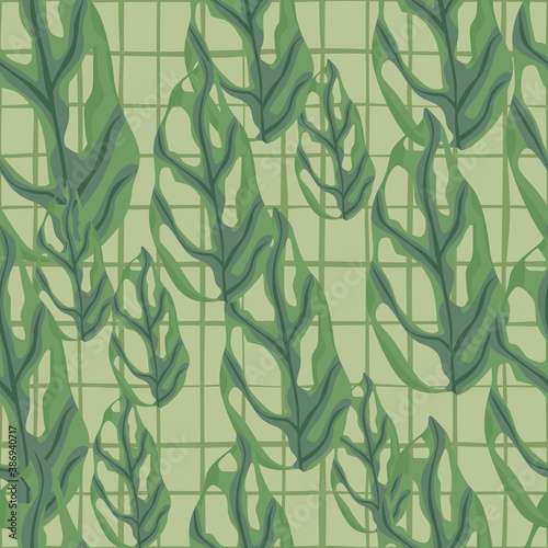 Fototapeta Naklejka Na Ścianę i Meble -  Random seamless pattern with marble monstera leaves ornament. Green tones foliage on chequered background.