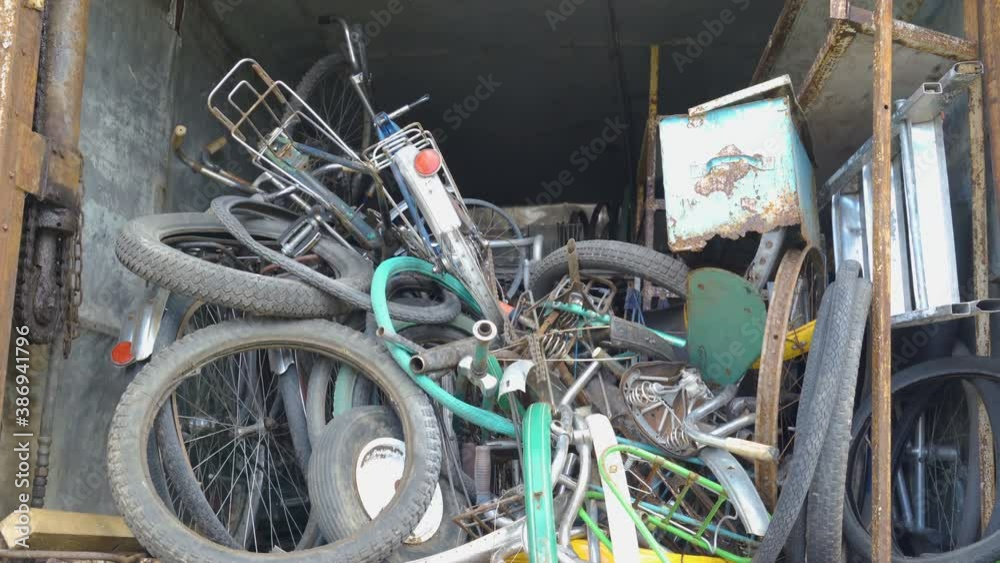 The stack of the broken and abandoned bicycles The stack of the broken and abandoned bicycles