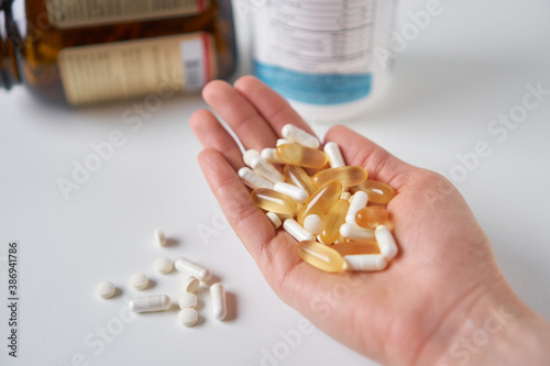 Medicine pills and supplements. Medicine in palm.  