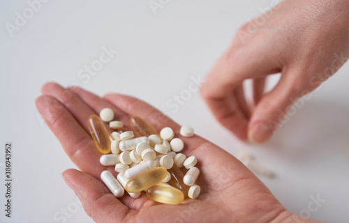 Medicine pills and supplements. Medicine in palm.  