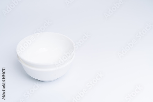 Two small white bowls isolated on white background  include clipping path