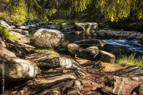 summer river with huge stones and trees, vydra, bohemian forest, czech republic photo