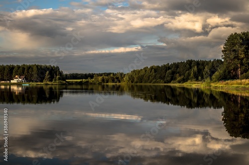 Fototapeta Naklejka Na Ścianę i Meble -  Mirror surface of forest lake in autumn, gold autumn, serenity of nature