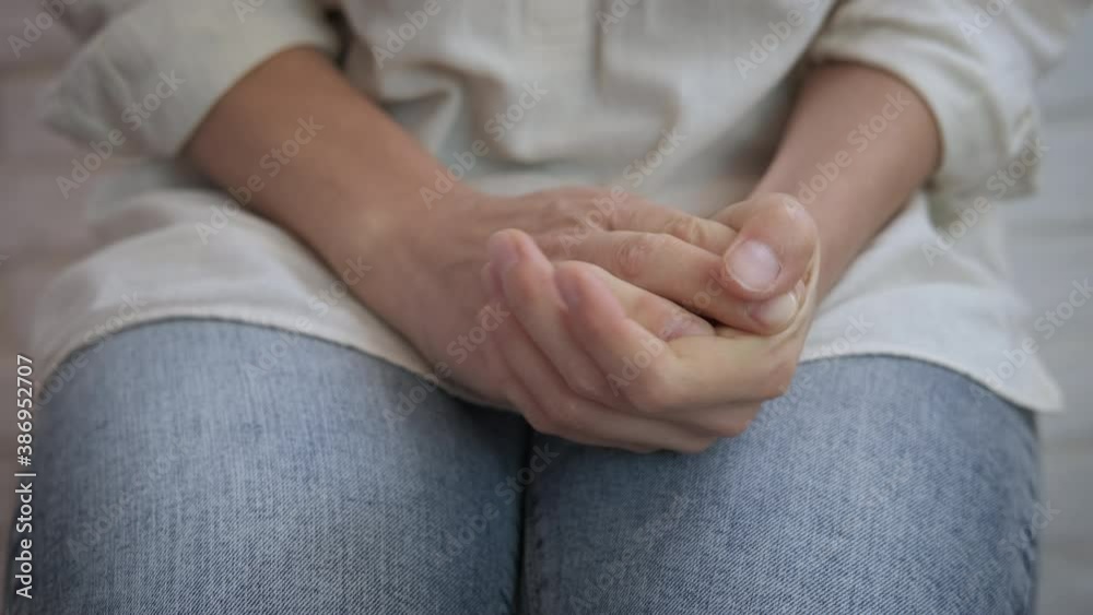 A woman hand with life problem. A view of a young woman's hands in the room. A woman hand with life problem. A view of a young woman's hands in the room.
