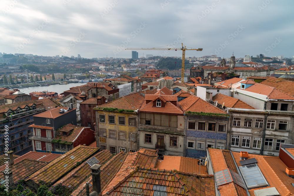 City of Porto, Portugal. Old city tiled roofs and urban sprawl.