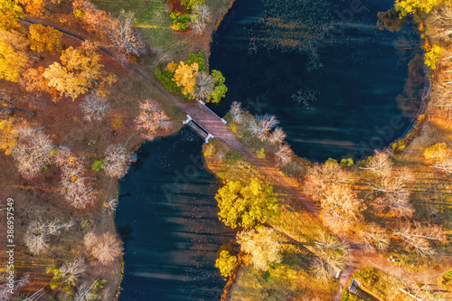 Bridge in autumn park top a...