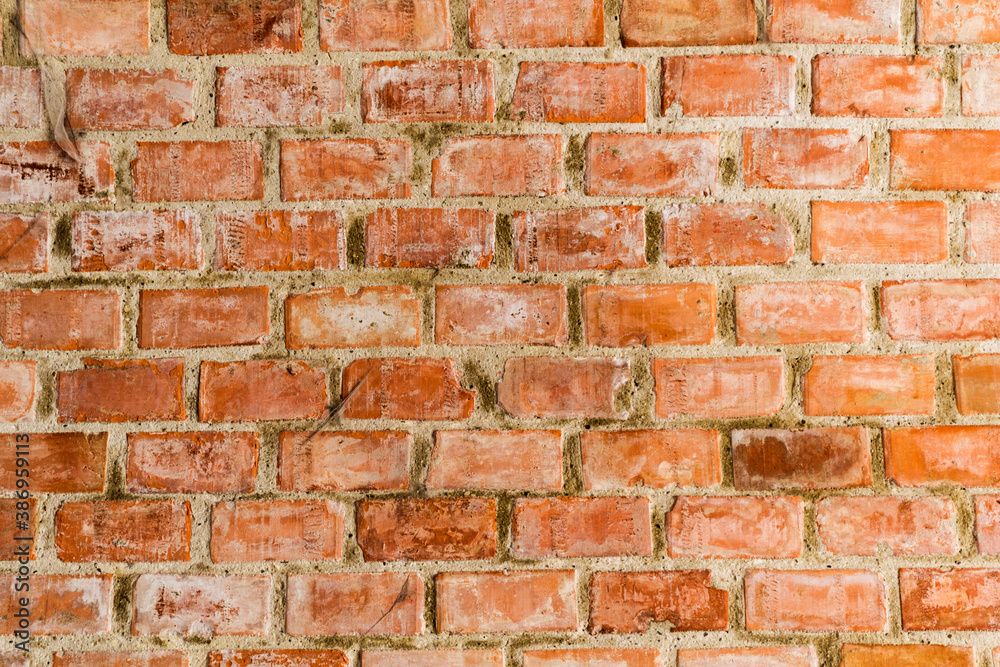 Obraz premium Old brick wall of a building, background, texture, pattern.