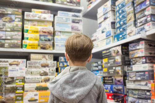 Little boy at hobby shop © WH_Pics