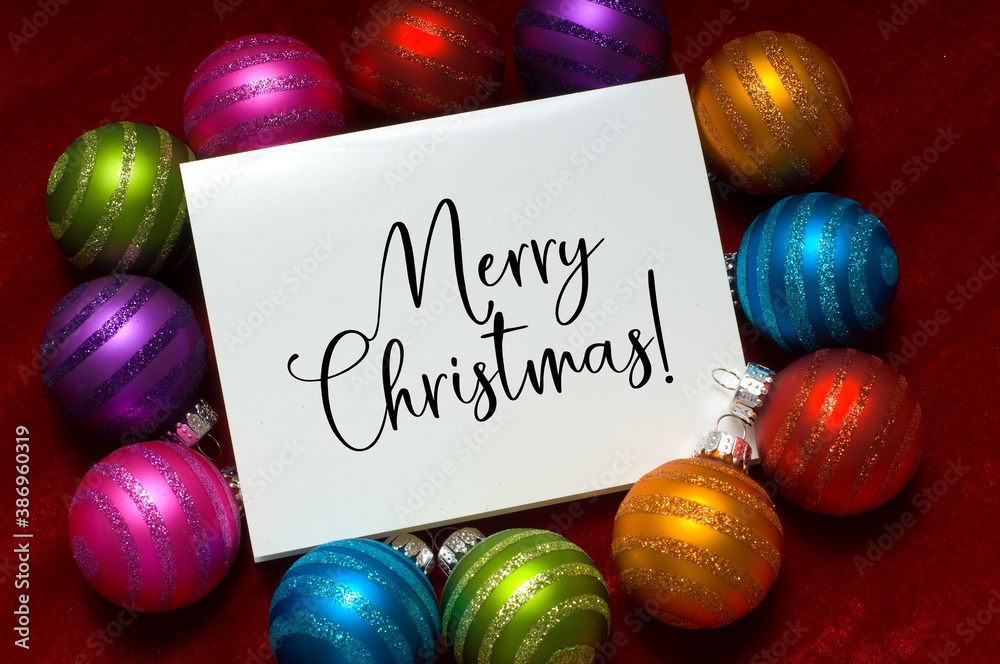 Φωτογραφία Christmas baubles, ball with note wishing Merry Christmas