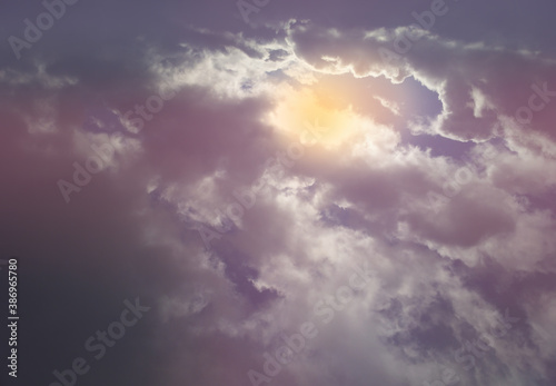 Pale light leak in cloudscapes backdrop
