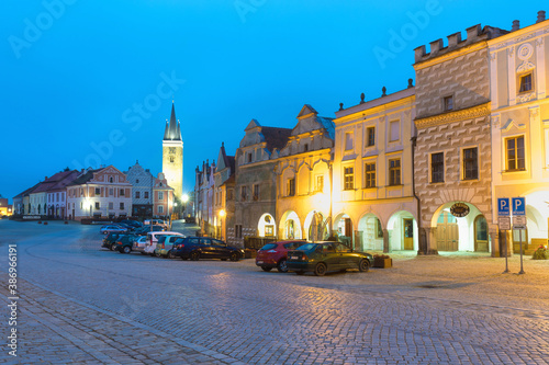 Traditional houses on the main square of Telc, South Moravia, Czech Republic. UNESCO heritage site. Town square in Telc with renaissance and baroque colorful houses. Early evening or night scene. © Michal