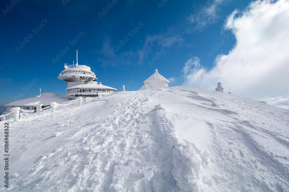 peak of Sniezka mountain in Giant Mountains on Poland and Czech republic border during winter